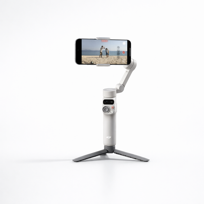 DJI Osmo Mobile 7 telefono stabilizatorius su magnetiniu laikikliu ir integruotu trikoju